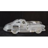A Daum clear and frosted glass Mercedes Gullwing, signed Daum France, 9 cm high Report by GH No