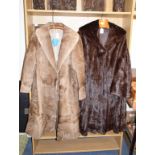 A lady's full length fur coat, and another fur coat, embroidered in Bradleys (2)