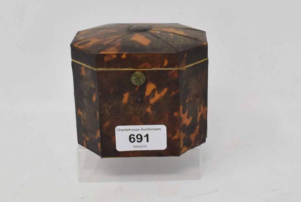 A late 18th/early 19th century tortoiseshell tea caddy, of shaped octagonal form, 9 cm high