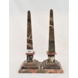 A pair of marble obelisks, repaired, 34.5 cm high