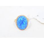 A 9ct gold and Gilson black opal ring, approx. ring size M Report by NG Modern