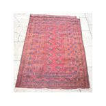 An Afghan rug, 184 x 123 cm