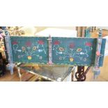 A Corsican cart back, with painted floral decoration on a green ground, 120 cm wide