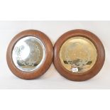 A pair of etched mirror roundels, in oak frames, 27.5 cm diameter (2)