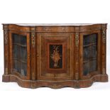 A Victorian serpentine front walnut credenza, with floral marquetry inlaid decoration, the panel