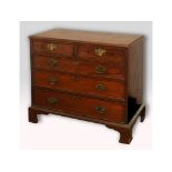 A 19th century walnut chest, of two short and three long drawers, on bracket feet, 94 cm wide See