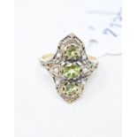 A 9ct gold, peridot and pearl ring, approx. ring size P½ Report by NG Modern