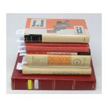 A stock book of British Empire stamps, including eight 2d stamps, and seven stamp reference books (