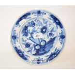 A Delft blue and white pottery plate, decorated flowers, 23 cm diameter, and four others (5)