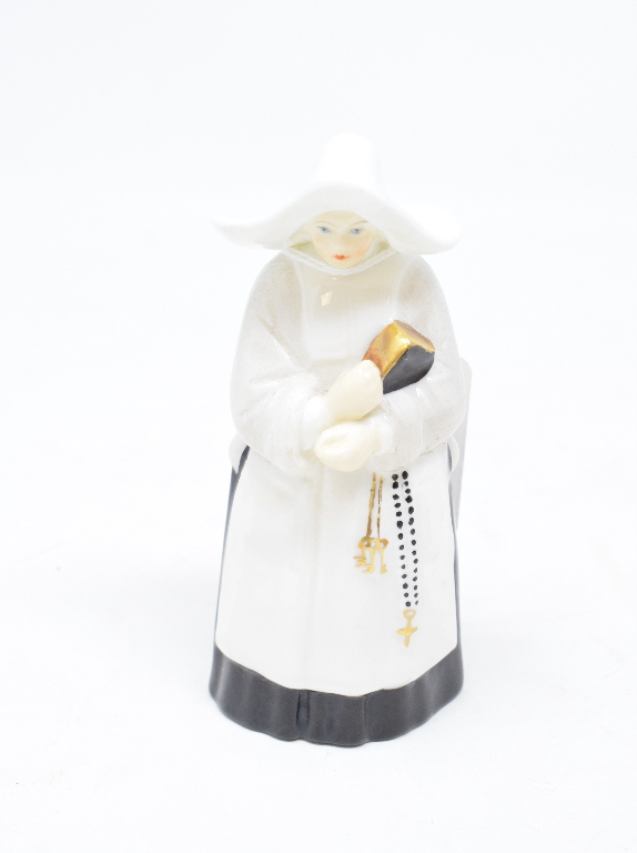 A Royal Worcester candle snuffer, Nun, 9 cm high