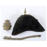 A blue cloth helmet, with chin strap detached and old moth, crushed, with a 1st Somersetshire RV