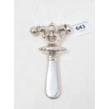 A novelty silver baby's rattle, in the form of a jester