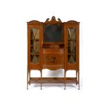 A late Victorian satinwood display cabinet, painted a classical bust, vases of flowers, scrolling