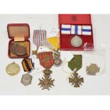 A Belgium Croix de Guerre, a French Croix de Guerre, other medals and decorations