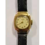 A lady's 9ct gold Centaur wristwatch, a brass ship's bulkhead style clock, 19 cm diameter, a brass
