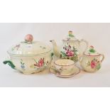 A matched French pottery tea and dinner service, decorated flowers and fruit, assorted Sowerby white