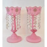 A pair of pink glass lustres, with gilt decoration, 33.5 cm high, another pair with painted