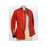 A red tunic top, with shoulder titles for T RE Wessex and GVR Royal Engineer buttons See