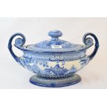 A 19th century blue and white pottery tureen and cover, with chinoiserie transfer printed