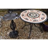 A garden table, with a mosaic top and metal legs, 90 cm diameter, and a bird bath (2)
