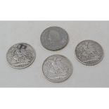 A George III crown, 1821, two Queen Victoria crowns, 1890 and 1892, and a Queen Elizabeth II £5