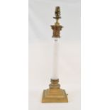 A gilt metal table lamp, with opaque glass column, 53.5 cm high (including fitment)