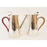 A pair of Asprey silver plated cafe au lait jugs, other plated items including a toast rack, three