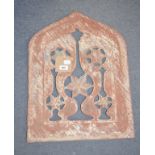 A Mughal red sandstone panel, of lancet form, decorated vessels and rosewater sprinklers, probably