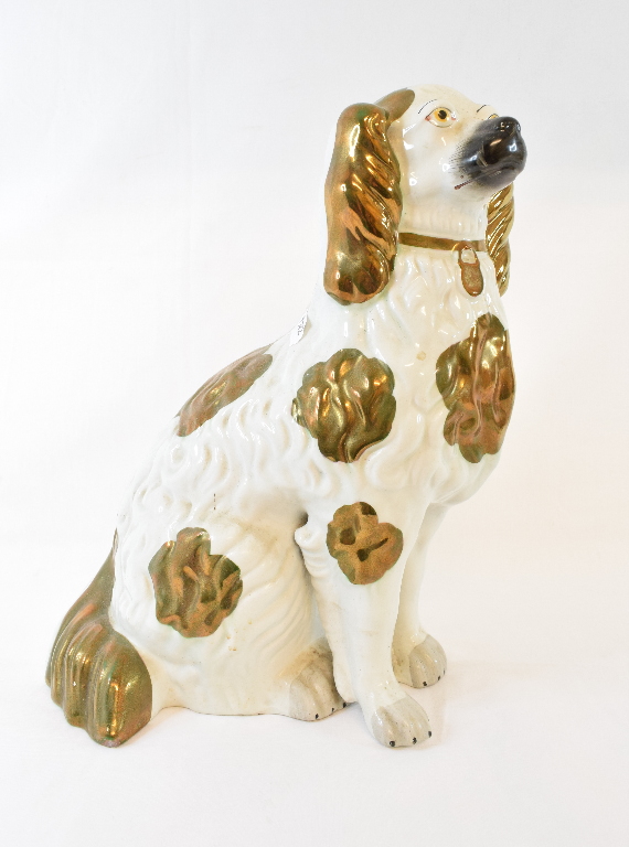 A large Staffordshire pottery spaniel, 37.5 cm high, other Staffordshire and a quantity of