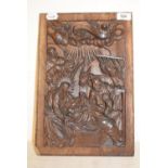 An oak panel, carved the Nativity scene, 37.5 x 25 cm