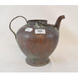 A 19th century Eastern copper swing handled pot, 22 cm high