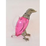 A novelty ruby glass decanter, with plated mounts, in the form of an eagle, 25 cm high