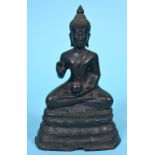 A Thai bronze Buddha, his left hand holding a vase, 19 cm high See illustration