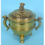 A Chinese polished bronze censer and cover, of slightly tapering ovoid form, the cover with a Dog of