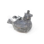 An Islamic bronze lamp, in the form of a bird, with ring suspension, 8.5 cm high