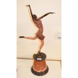 An Art Deco style painted bronze figure, of a dancing lady, on a marble base, 64 cm wide Report by