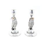 A pair of Victorian silver plated candlesticks, in the form of owls, with glass eyes, 20 cm high (2)