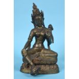 A Nepalese brass figure, Tara, on a double lotus base, 33.5 cm high See illustration