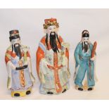 A Chinese porcelain figure, 25 cm high, two similar figures, and other Oriental ceramics (box)