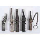 An Indian silver coloured metal hookah mouthpiece, in the form of an elephant, 12 cm, and four other