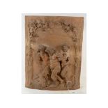 Lacour, a terracotta panel decorated in high relief two fauns escorting a Bacchus, slight damage,