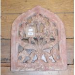 A Mughal sandstone panel, of lancet form, with floral decoration, 41 cm wide