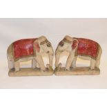 A pair of Indian carved marble and painted elephants, 13 cm high, and other similar marble and