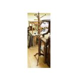 A turned hat stand, on tripod base, 183.5 cm high