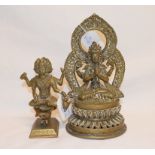 A Nepalese brass figure, Tara, on double lotus thrones, 21 cm high, and an Indian brass Skanda, 13