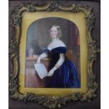 English school, 19th century, a three quarter length portrait miniature of a girl in a velvet