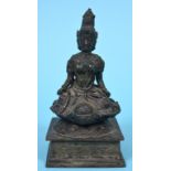 An Indonesian bronze figure, Tara, on a rectangular base, 17 cm high See illustration