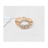 An 18ct gold floating diamonds ring, approx. ring size KÂ½ Report by NG Approx. 3.5 g (all in)