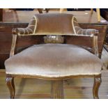 An Edwardian inlaid mahogany tub chair