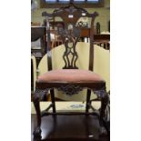 An 18th century dining chair, with a pierced and carved decoration Report by GH Chair has